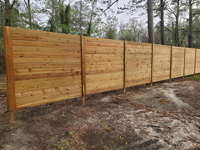 Rough Cut Horizontal Privacy Fence, Heart Pine Floors